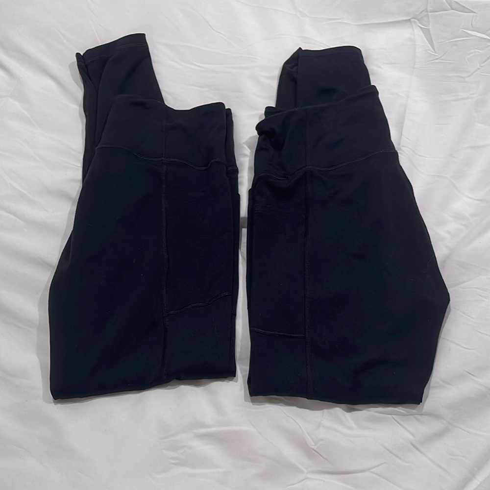 2 pairs of Victoria’s secret ON POINT FLOW leggings.